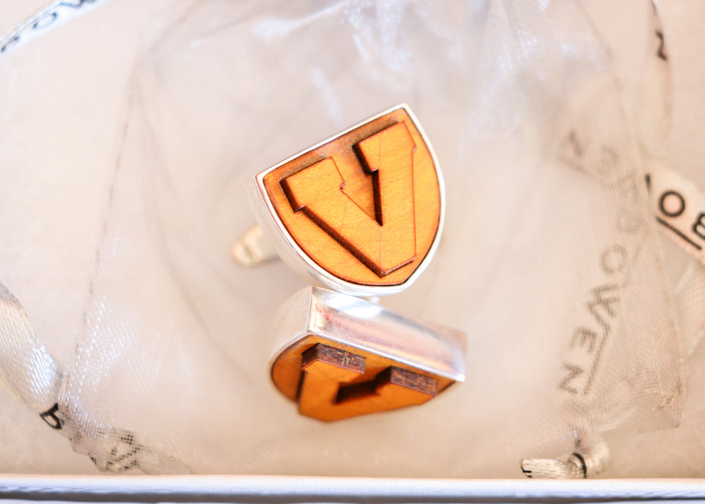 Cufflinks cut from center court - King Field House